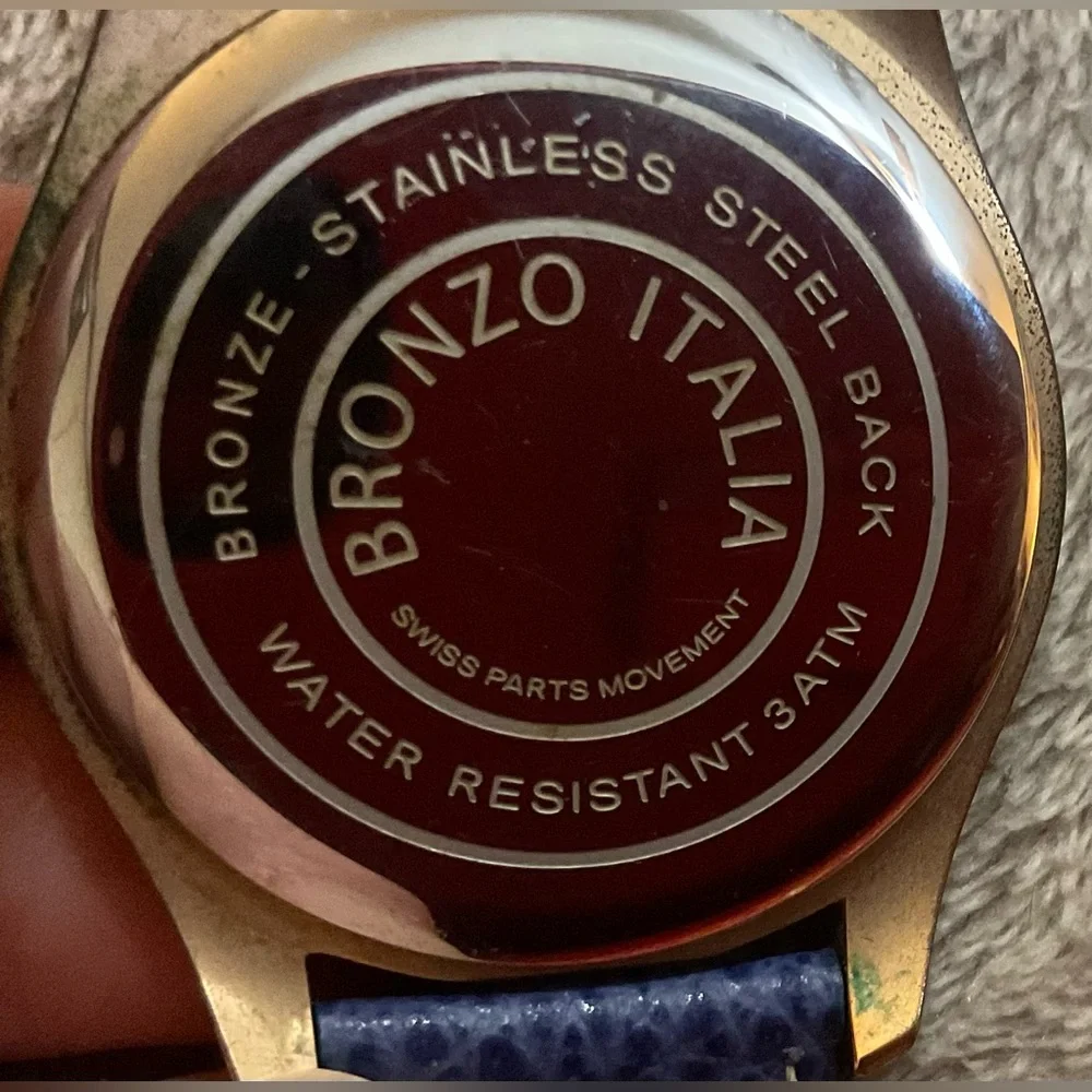 Bronzo Italia: woman’s rose/gold/tone Roman numerals numbers boyfriend watch.